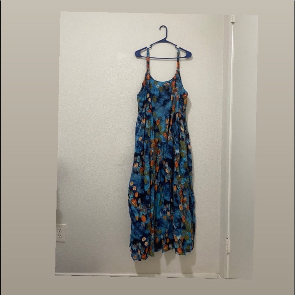 New (tried on once ) blue float dress